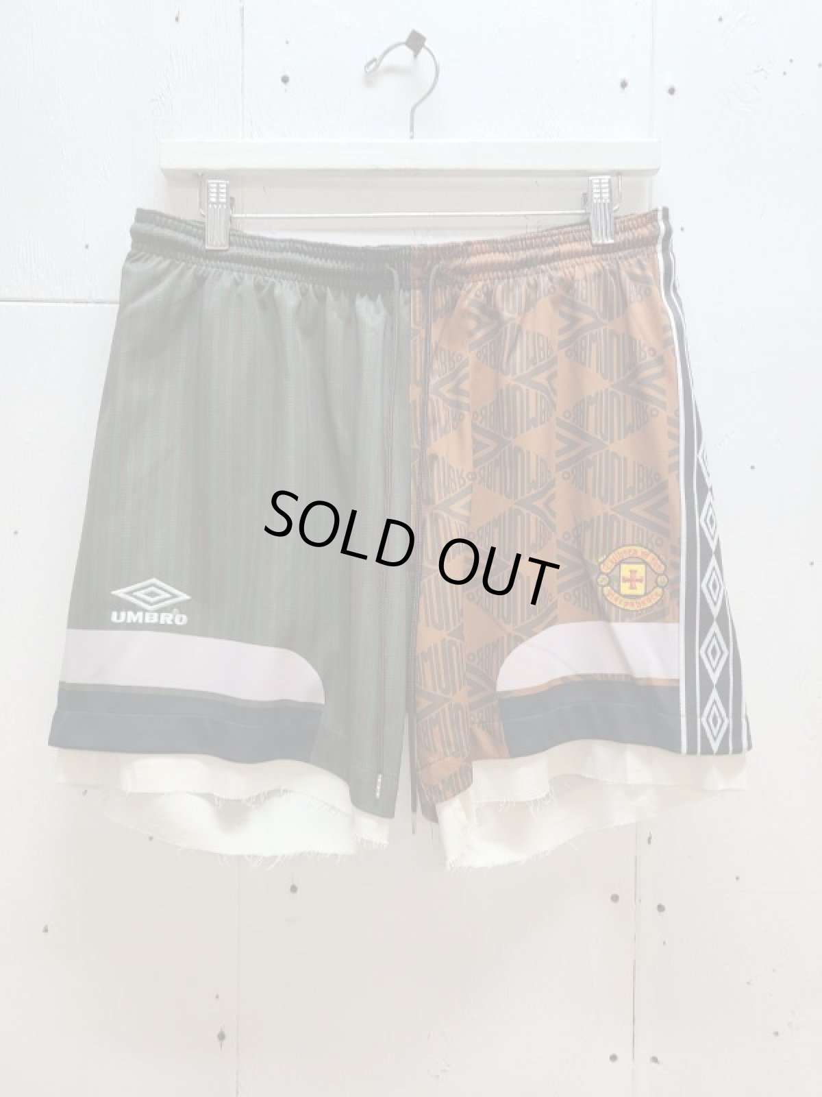 画像1: Children of the discordance(チルドレンオブザディスコーダンス) × UMBRO(アンブロ) CHANGEOVER GAME PANTS DISUMBPT002(BRN) (1)